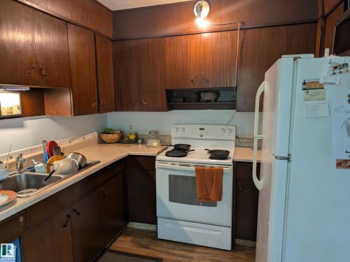 10650 76 Avenue, Edmonton, AB - Indoor Photo Showing Kitchen With Double Sink