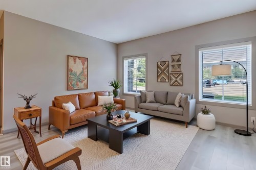 #106 160 Magrath Rd Nw, Edmonton, AB - Indoor Photo Showing Living Room