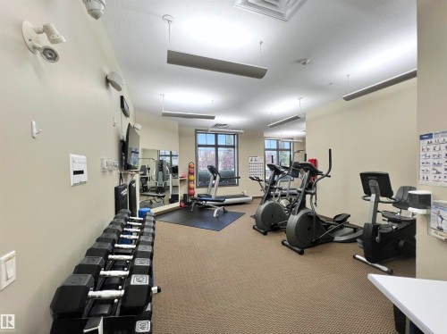 #106 160 Magrath Rd Nw, Edmonton, AB - Indoor Photo Showing Gym Room