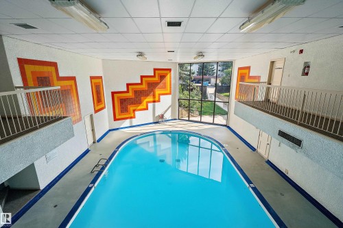 #315 5520 Riverbend Rd Nw, Edmonton, AB - Indoor Photo Showing Other Room With In Ground Pool
