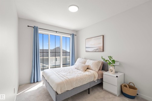 Expansive window featuring multiple panes and black framing - 8047 227 Street Nw, Edmonton, AB - Indoor Photo Showing Bedroom