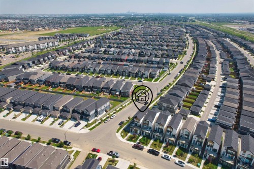 Established residential neighborhood featuring a variety of single-family homes with uniform rooflines and street layouts - 8047 227 Street Nw, Edmonton, AB - Outdoor With View