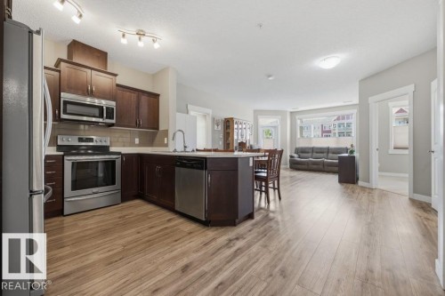#205 511 Queen St, Spruce Grove, AB - Indoor Photo Showing Kitchen With Stainless Steel Kitchen