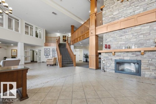 #205 511 Queen St, Spruce Grove, AB - Indoor With Fireplace