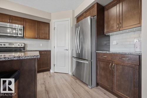 5806 66 Street, Beaumont, AB - Indoor Photo Showing Kitchen With Stainless Steel Kitchen