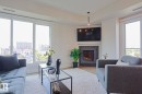 #703 10303 111 St Nw, Edmonton, AB  - Indoor Photo Showing Living Room With Fireplace 