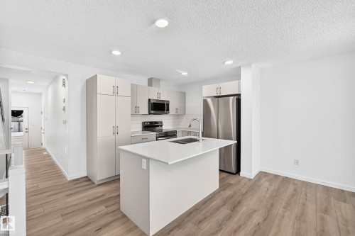 #4 905 172 St Sw, Edmonton, AB - Indoor Photo Showing Kitchen With Double Sink