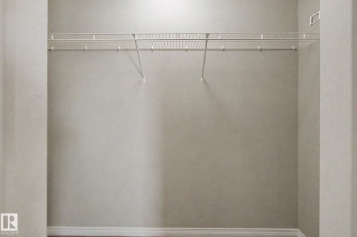 Closet space featuring a wire shelving system and a neutral wall color - 315 Watt Boulevard Sw, Edmonton, AB 