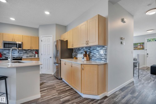 #29 4821 Terwillegar Cm Nw, Edmonton, AB - Indoor Photo Showing Kitchen With Double Sink