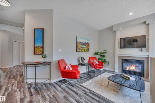 #29 4821 Terwillegar Cm Nw, Edmonton, AB - Indoor Photo Showing Living Room With Fireplace