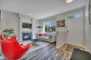 #29 4821 Terwillegar Cm Nw, Edmonton, AB  - Indoor Photo Showing Living Room With Fireplace 