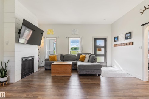 5406 Poplar Lane, Athabasca Town, AB - Indoor Photo Showing Living Room With Fireplace