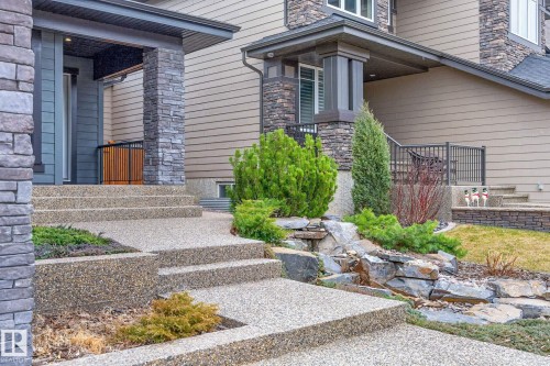 Exposed aggregate concrete steps and walkways - 1313 Hainstock Way Sw, Edmonton, AB - Outdoor