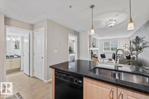 #115 11453 Ellerslie Rd Sw, Edmonton, AB - Indoor Photo Showing Kitchen With Double Sink