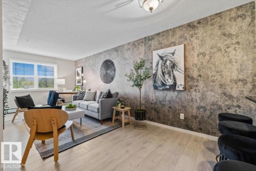 #115 11453 Ellerslie Rd Sw, Edmonton, AB - Indoor Photo Showing Living Room