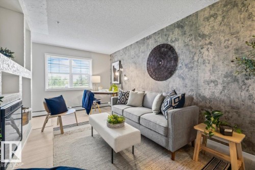 #115 11453 Ellerslie Rd Sw, Edmonton, AB - Indoor Photo Showing Living Room