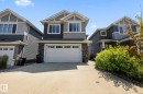 Contemporary two-story exterior with multi-toned siding and stone detailing - 3870 Robins Crescent Nw, Edmonton, AB  - Outdoor With Facade 