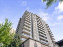 Modern high-rise residential building featuring multiple levels of private balconies with clear glass railings - #707 9819 104 St Nw, Edmonton, AB  - Outdoor With Facade 