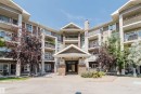 Multi-story residential building featuring balconies with wrought iron railings - #7306 7327 South Terwillegar Dr Nw, Edmonton, AB  - Outdoor With Balcony With Facade 