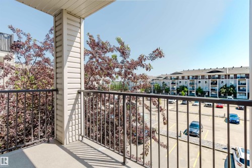 Outdoor balcony with concrete flooring and dark metal railings - #7306 7327 South Terwillegar Dr Nw, Edmonton, AB - Outdoor With Balcony