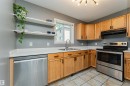 #134 10909 106 St Nw, Edmonton, AB  - Indoor Photo Showing Kitchen With Double Sink 