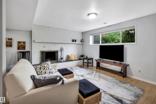 10282 87 Street Nw, Edmonton, AB - Indoor Photo Showing Living Room With Fireplace