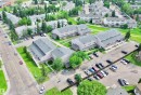 Multi-unit residential property featuring multiple buildings with individual entrances, paved parking areas, and mature landscaping - #29 13580 38 St Nw, Edmonton, AB  - Outdoor With View 