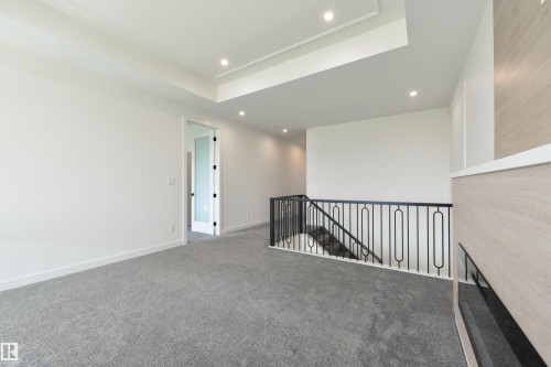 23 Lakevista, Beaumont, AB - Indoor Photo Showing Other Room