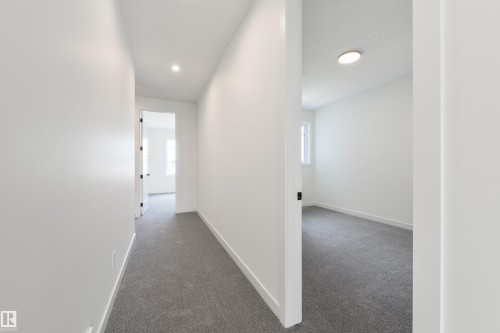 23 Lakevista, Beaumont, AB - Indoor Photo Showing Other Room