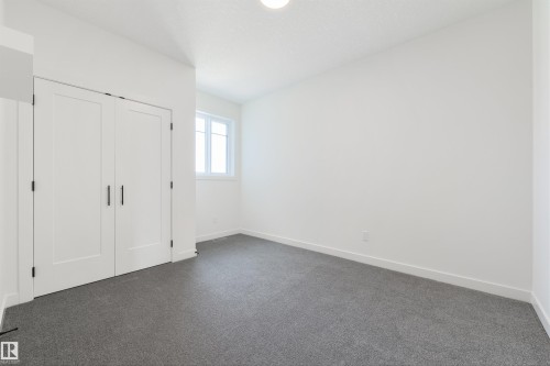 23 Lakevista, Beaumont, AB - Indoor Photo Showing Other Room