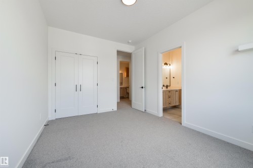 23 Lakevista, Beaumont, AB - Indoor Photo Showing Other Room