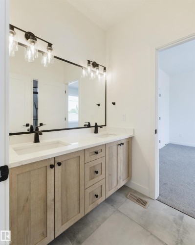 23 Lakevista, Beaumont, AB - Indoor Photo Showing Bathroom