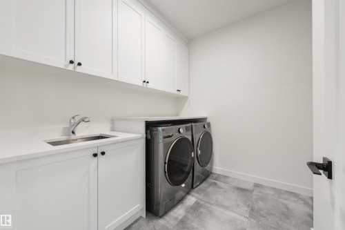 23 Lakevista, Beaumont, AB - Indoor Photo Showing Laundry Room