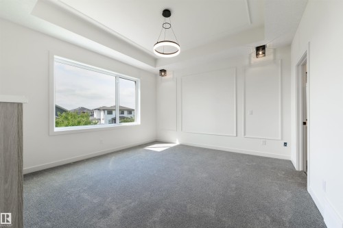 23 Lakevista, Beaumont, AB - Indoor Photo Showing Other Room