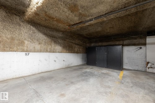 Image quality insufficient for description - #103 12838 65 St Nw Nw, Edmonton, AB - Indoor Photo Showing Garage