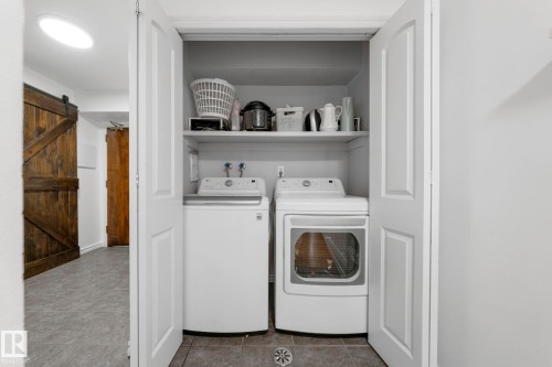 #105 11011 86 Av Nw, Edmonton, AB - Indoor Photo Showing Laundry Room