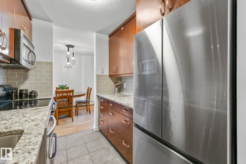#105 11011 86 Av Nw, Edmonton, AB - Indoor Photo Showing Kitchen With Upgraded Kitchen