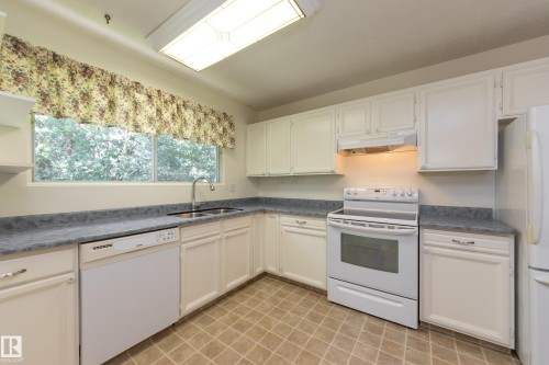 84 Larose Drive, St. Albert, AB - Indoor Photo Showing Kitchen With Double Sink