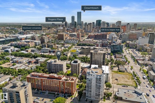 Aerial perspective of an urban setting with multiple high-rise buildings and commercial structures - #503 10175 114 St Nw, Edmonton, AB - Outdoor With View