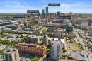 Aerial perspective of an urban setting with multiple high-rise buildings and commercial structures - #503 10175 114 St Nw, Edmonton, AB  - Outdoor With View 