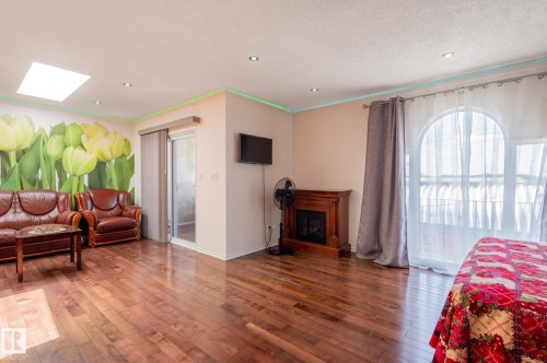 11916 71 Street Nw, Edmonton, AB - Indoor Photo Showing Living Room With Fireplace