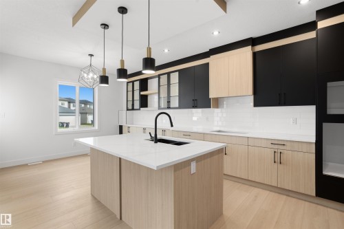 409 Munn Court, Leduc, AB - Indoor Photo Showing Kitchen With Upgraded Kitchen