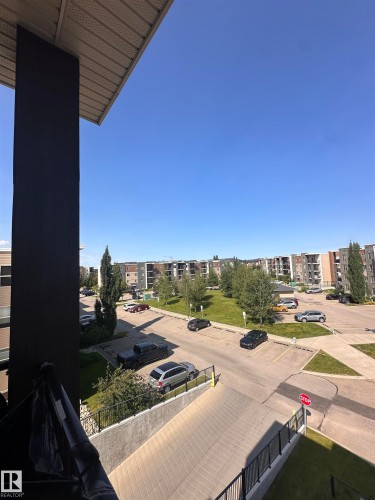 Balcony offering exterior space with a metal railing - #419 11808 22 Av Sw, Edmonton, AB - Outdoor With View
