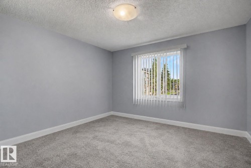 #311 7511 171 St Nw, Edmonton, AB - Indoor Photo Showing Other Room