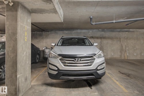 Conveniently located across from the elevator - #311 7511 171 St Nw, Edmonton, AB - Indoor Photo Showing Garage