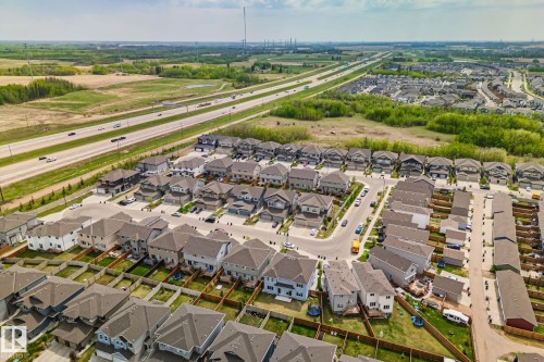 Expansive aerial perspective showcasing a residential community with multiple detached properties - 249 39A Avenue, Edmonton, AB - Outdoor With View