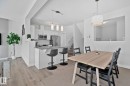 Open-concept living space with light wood-finish flooring - 249 39A Avenue, Edmonton, AB  - Indoor 