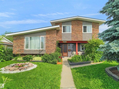 Multi-level residence featuring a brick and aggregate stone exterior - 15603 122 Street Nw, Edmonton, AB - Outdoor