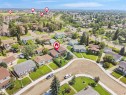 Aerial view of a residential neighborhood with established homes and mature trees - 15603 122 Street Nw, Edmonton, AB  - Outdoor With View 