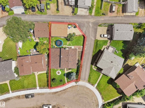 Aerial view showcasing a residential property with a brown shingle roof and a green lawn - 15603 122 Street Nw, Edmonton, AB - Outdoor With View